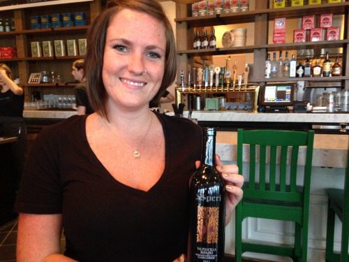 Waitress with bottle of wine