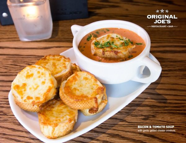 tomato soup with melted cheese