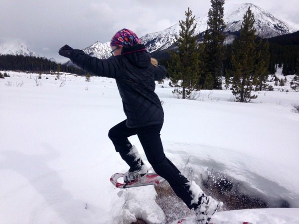 girl snowshoeing