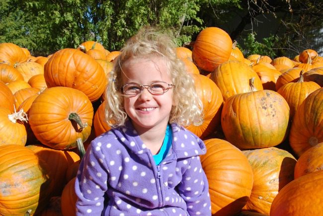 children in pumpkin patch