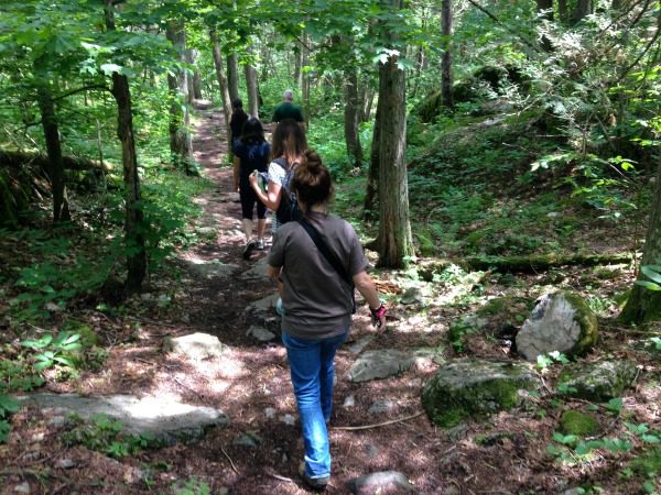 group hiking along path