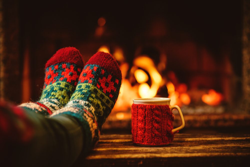 feet up by the fireplace mug of tea 