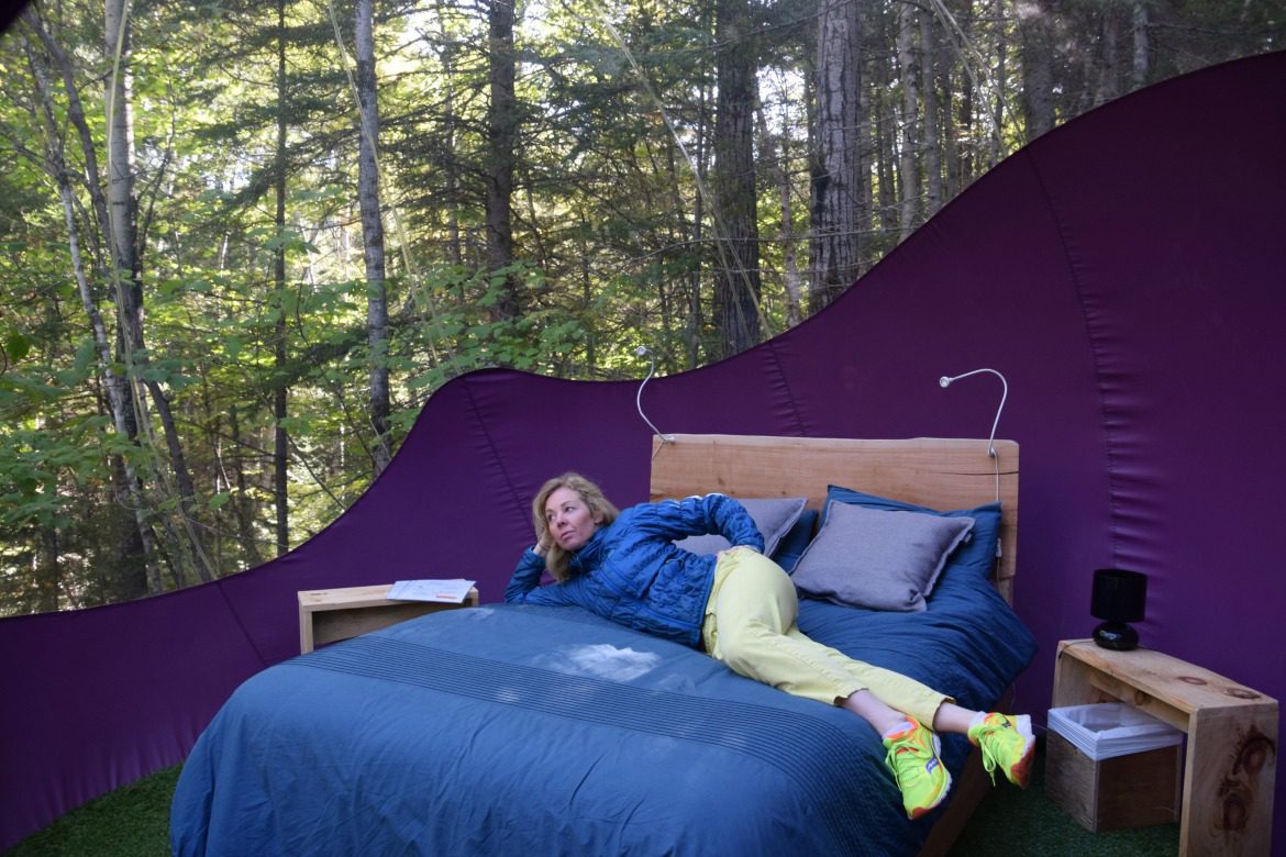 woman inside glamping tent