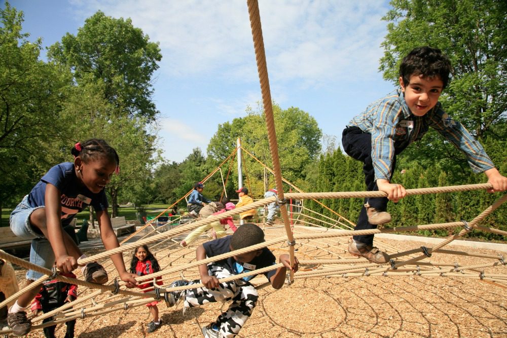 kids playing on playground equipment