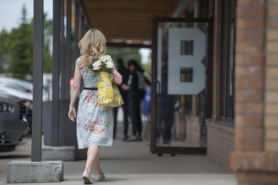 shopping bag filled with flowers