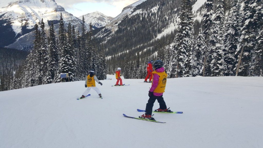 family skiing in canada